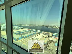 Two bedrooms and a living room, furnished and with parking, in the Orient Towers, Al Bustan area, cl