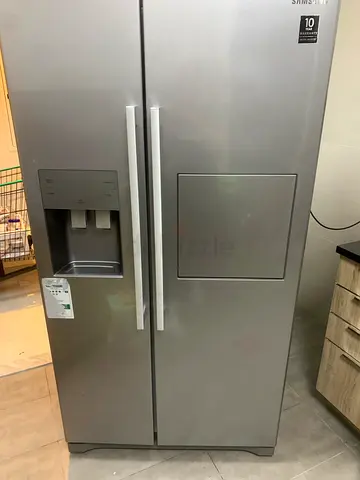 Samsung Side-by-Side Refrigerator with Water Dispenser - Good Condition