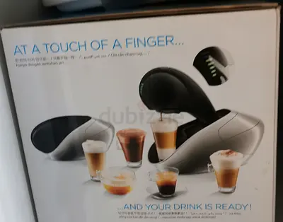 Single-serve capsule coffee  espresso machine - compact, one-touch operation