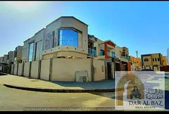 Villa for annual rent in Al Yasmin area, Ajman. The villa consists of 5 bedrooms, 8 bathrooms, a mai