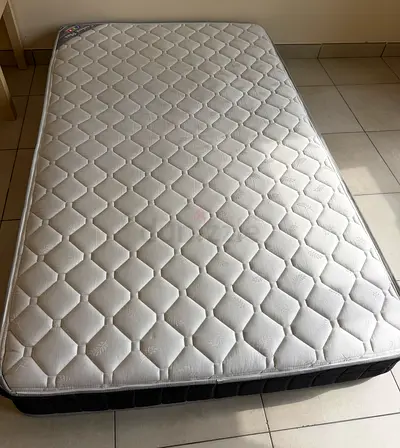 Single mattress in good condition — firm support