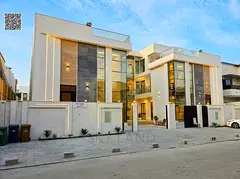 Luxury villa with a rooftop terrace, private garden, separate entrance, and super deluxe finishing,