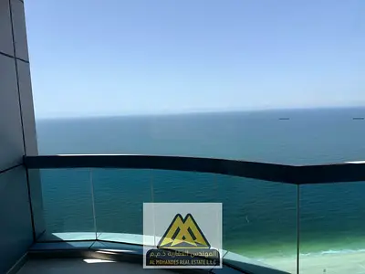 فرصة سكنية فاخرة صف أول على البحر: شقة غرفتين وصالة ماستر بإطلالة بحرية كاملة وباركن مجاني في أبراج كورنيش عجمان