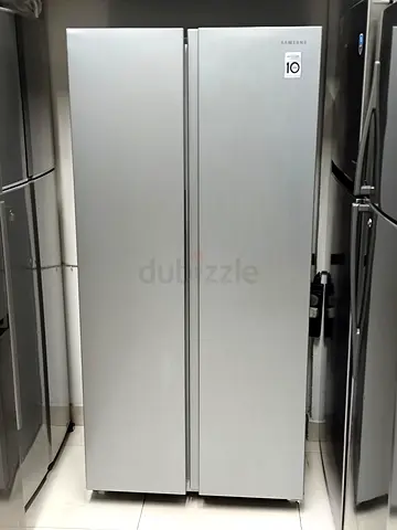 Samsung big size fridge side by side like new condition neat and clean for sale