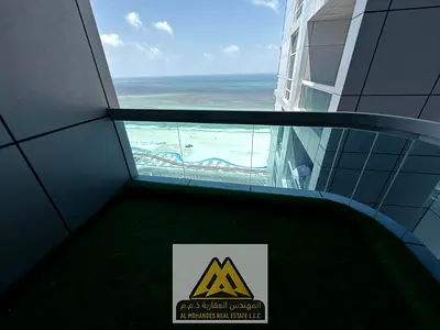 Two bedrooms and a large living room with a balcony offering sea views, located on Ajman Corniche, close to all services and main roads.