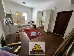 Spacious ground floor studio apartment for rent in Al Jurf 2, Ajman | Semi-separate kitchen | Centra