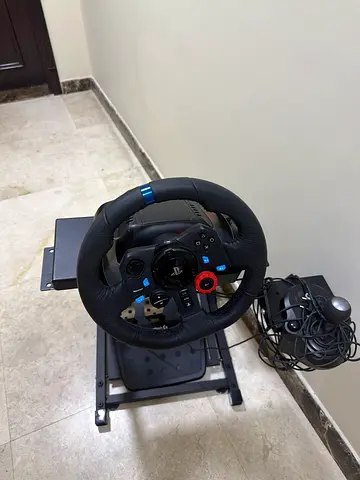 Logitech racing wheel with pedals and stand (works with PlayStation/PC)