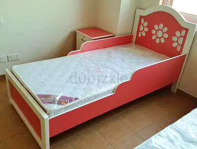 Single pink floral toddler bed with mattress - good quality
