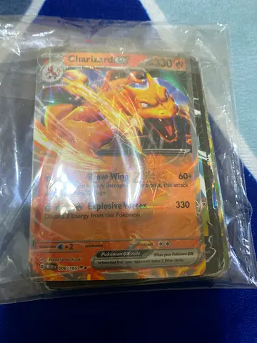 Charizard EX Pokémon Card - Holographic Collectible (Sleeved)