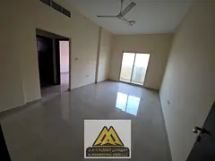 A spacious one-bedroom apartment is available for annual rent in Al Rumaila 1, Ajman, just minutes f