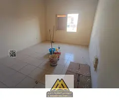 For annual rent in Al Nuaimiya 1 Ajman, Kuwait Street, studio with central AC and free maintenance b