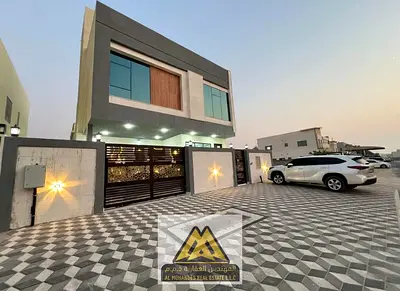 Al Zahya, Ajman, featuring a modern design and spacious layout ideal for family living in a quiet and prime location. The villa includes 6 bedrooms, a