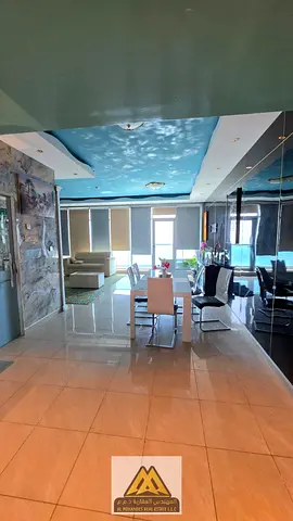 Beautiful views of Ajman Corniche, 2 bedrooms, living room, balcony, 4 bathrooms. Area: 2,150 sq ft. Stunning sea and city views.