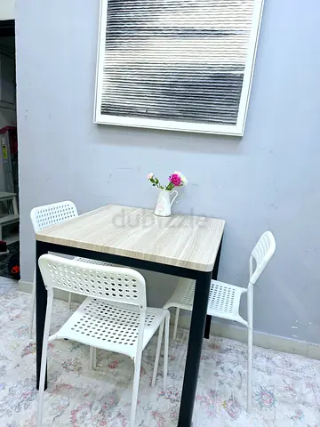 Modern Dining Table with 3 White Chairs