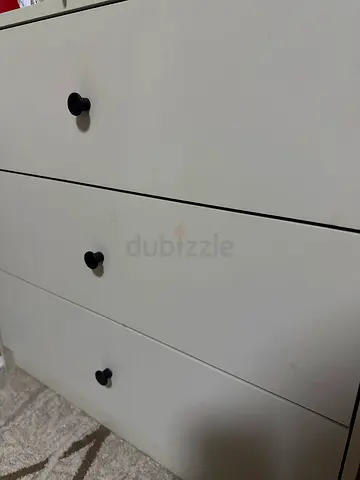 A white three-drawer chest
