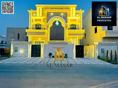 Classic-style villa in Al Helio, Ajman—two floors plus a roof terrace; freehold ownership availabl