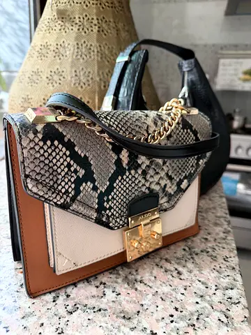 Black croc-effect shoulder bag by Vince Camuto, gently used still new