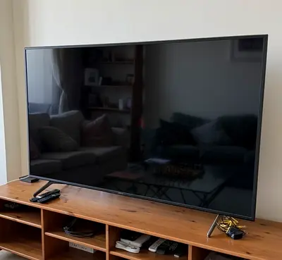 65inch LED TV in excellent condition - slim bezel, stand included