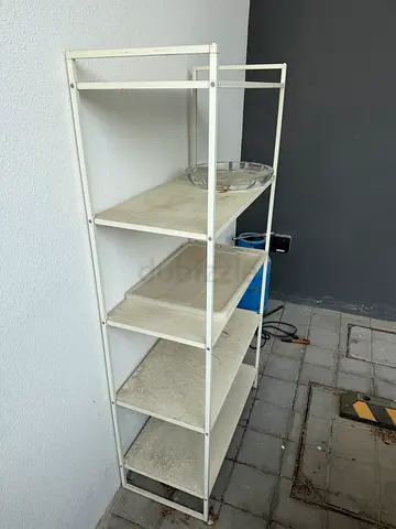 White metal shelving unit