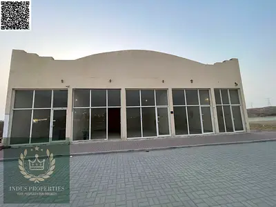 فرصة للمستثمرين: 9 محلات تجارية للبيع في عجمان (المنامة) - تصريح بناء أرضي + 4 طوابق.