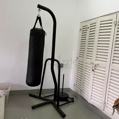 Heavy bag and freestanding stand with weight plates - good condition