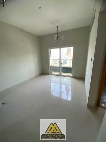 شقة للإيجار في النخيل 1 عجمان ثاني ساكن ببلكونة وتكييف مركزي ومطبخ مغلق وقريبة من لولو ونستو