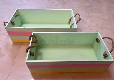 Pair of pastel boxes with rope handles