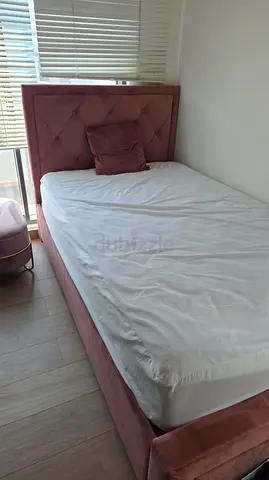 Single pink velvet bed frame with headboard and storage (good condition)