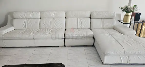 L shape -Leather sofa - cream color for immediate sale.