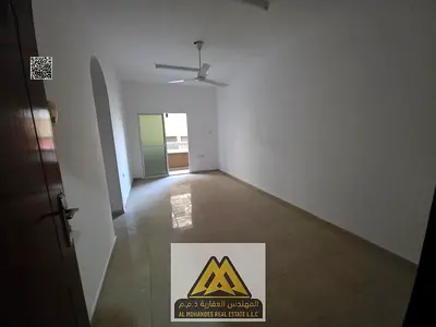 1-bedroom apartment with a hall in Al Rumaila 1, Ajman Corniche, 2 balconies, large space, no AC. AED 24,000 yearly, payable in 6 installments.