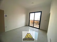 Brand-new 1-bedroom apartment in Al Alia, Ajman, 2 baths, balcony, central AC, wardrobes, AED 32,000