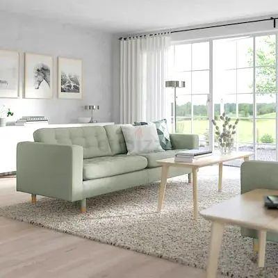 Light green three-seater sofa