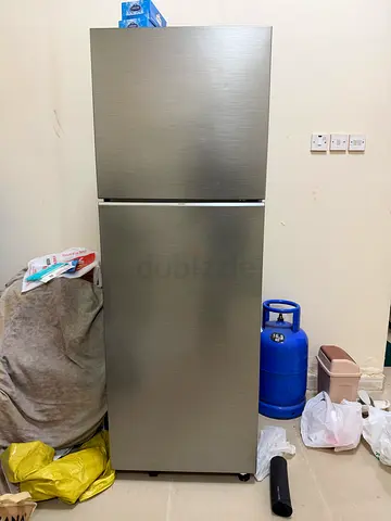 Used double-door refrigerator in good working condition