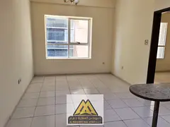 Cheapest one-bedroom apartment with a large living room in Al Hamidiya area, Garden City Towers, nex