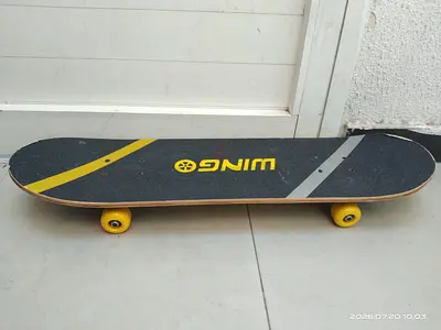 Wing Skateboard with Yellow Wheels