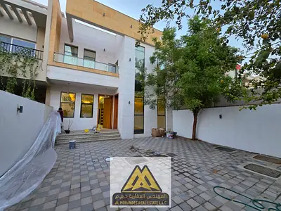Luxury villa with 5 master bedrooms | Two spacious living rooms with a comfortable design | Fully equipped kitchen with a practical layout | Large cou