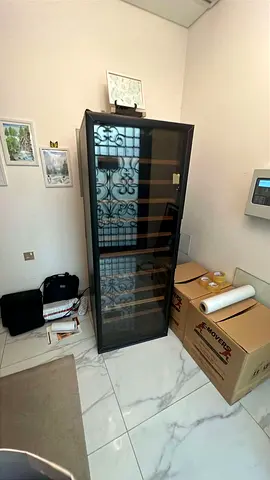 Eurocave Dual zone Tall black glass-front wine cooler / display cabinet - good condition