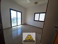 One-bedroom apartment for annual rent in Al Jurf 2, Ajman. Balcony, wall cabinets, spacious layout,