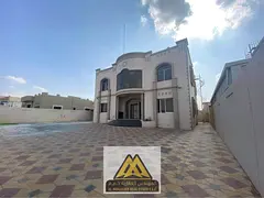 Luxury Two-Storey Villa with Multiple Majlis, Master Bedrooms, Built-in Wardrobes and Prime Road-Fac