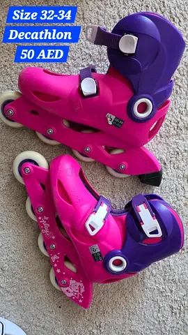 Childrens adjustable inline skates size 32-34 - pink/purple