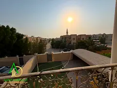 Villa for rent in Muwaihat 1: features five master bedrooms, a majlis, a living area, a balcony, a p