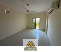 Annual rent: 1-bedroom apartment in Al Mowaihat 1, balcony, closed kitchen, split AC, near Al Tallah