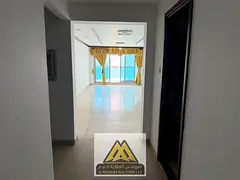 2-bedroom apartment in Corniche Tower Ajman, full sea view, high floor, free parking, AED 68K, 4 pay