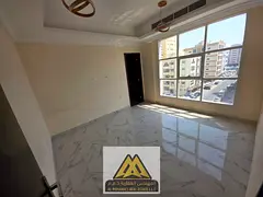 Two-bedroom apartment for rent in Al Nuaimiya 1, Ajman. Master bedroom, balcony, private parking, pr