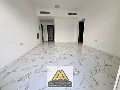 For annual rent, a one-bedroom apartment in Al Rashidiya 2, Ajman, second occupant, featuring a vibrant location near Ladies Park, and close to all es