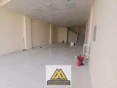 Commercial Shop for Rent in Ajman Industrial Area 2 on Oman Street with Mezzanine Suitable for All B