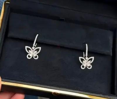 Butterfly diamond drop earrings in white gold (pair)
