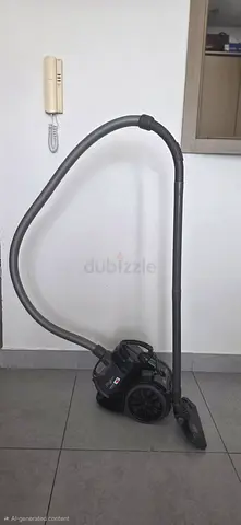 Compact canister vacuum cleaner - good working condition