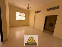 Two-bedroom apartment for annual rent in Al Jurf 2, Ajman. Two bathrooms, closed kitchen, central AC