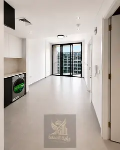 One-bedroom apartment with a living room for sale in Aljada; features a pool view, "super deluxe" fi